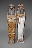 Yellow-painted mummiform lid and daily dress mummy board