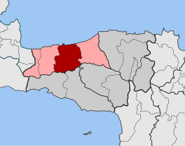 Localização da unidade municipal (vermelho) e do município de Retimno (rosa) na unidade regional homónima