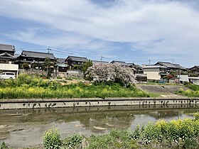 古川対岸から望む東一口集落