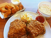 Hot & spicy chicken, colonel rice, coleslaw and nuggets in Malaysia