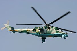 Ukrainian Mi-24 attack helicopter flying overhead