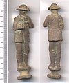 Early twentieth-century pipe tamper depicting a soldier in uniform smoking