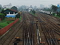 The railtracks of the station seen from the HOS Tjokroaminoto street