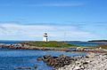 Lighthouse of Marche Point, standing at the edge of Cap Auguet