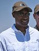 Leslie Frazier wearing a cap and sunglasses