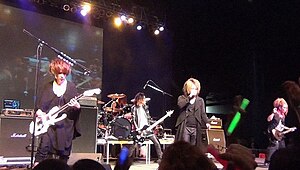 Japanese visual kei rock band Nightmare performing live in 2014