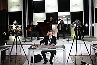 Calligrapher Petr Chobitko at the opening ceremony of the I International exhibition of calligraphy