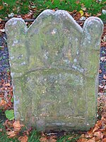 A memorial bearing a bodkin, shears and an iron.