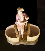 18th century figurine with condiment-holder