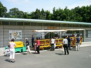 Station entrance with electric tourist train