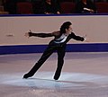 Clockwise back crossover, during the scissoring motion after the wide step. (Johnny Weir)