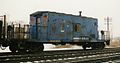 A transfer caboose passing through Porter, Indiana