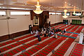 Inside the praying hall with the three chandeliers, bringing from China