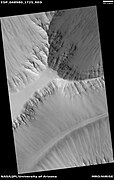 Wide view of layers in the Louros Valles, as seen by HiRISE under HiWish program. The Louros Valles are part of Ius Chasma.