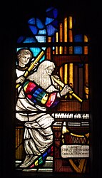 "Church Musicians". Whall window in Gloucester Cathedral. Image courtesy of Aidan McRae Thomson.