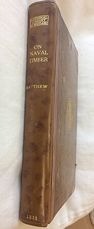c.1960, 3/4 rebound in leather Showing spine and front marbling, and the library's markings.
