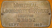 A brass boilerplate mounted on a wooden surface, and inscribed "Montreal Locomotive Works limited 53632 September 1913"