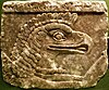 A bird-headed Apkallu on a relief at the palace of Ashurnasirpal II