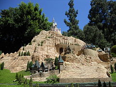 French village featuring a castle from Cinderella