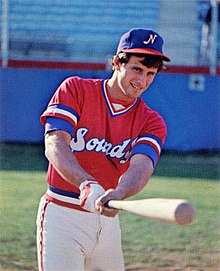 A baseball player in red and white