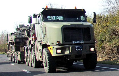 A British Army Oshkosh M1070F and a 7-axle King GTS 110/7 semi-trailer