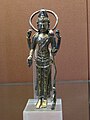 Avalokiteshvara holding a rosary and a book