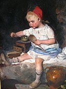 Young girl with wooden spoon and coffee mill