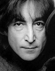 Cropped, black and white image showing the face of musician John Lennon in 1980.
