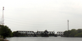 The Baltimore and Ohio Railroad Bridge, built in the late 19th or early 20th century as a two track, swing bridge across the Schuylkill River in the Grays Ferry neighborhood in Philadelphia, Pennsylvania. Now a CSX Philadelphia Subdivision bridge. View of the bridge looking downstream.