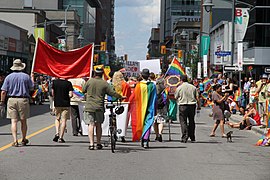 Participants marching down Bank Street in the parade, 2014