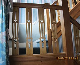 Balusters influenced by the Arts and Crafts movement in a 1905 row of houses in Etchingham Park Road (Finchley, London)