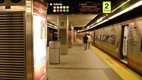 Looking down Platform A. A train to Far Rockaway is on the right