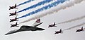 Image 65Concorde (and the Red Arrows with their trail of red, white and blue smoke) mark the Queen's Golden Jubilee. With its slender delta wings Concorde won the public vote for best British design. (from Culture of the United Kingdom)