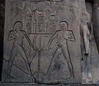 Low relief within a sunk outline, linear sunk relief in the hieroglyphs, and high relief (right), from Luxor
