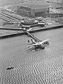 Aerial view of a Boeing 314 Clipper at the Marine Air Terminal circa 1940