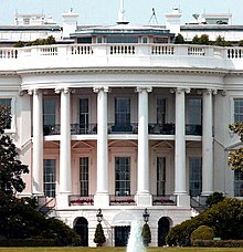 A south side view of the White House, showing the ground floor and the Truman Balcony on the second floor