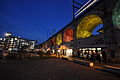 Illuminated Wipkinger Viadukt with shops (Im Viadukt).