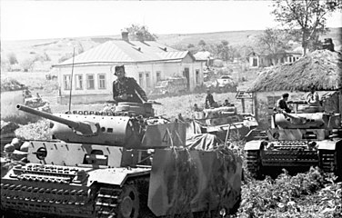 Panzer III tank equipped with the Nebelwurfgerät behind the Schürzen