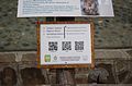A QRpedia plaque in Skopje Zoo, North Macedonia, showing info on a hamadryas baboon (Papio hamadryas) using a mixed approach