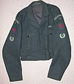 No.2 Battledress blouse (1948) showing medal ribbon bar and plastic coast watcher buttons. Sleeves: Shoulder flash, Group numeral, Red "Spitfire" proficiency and Leading Observer rank badges.