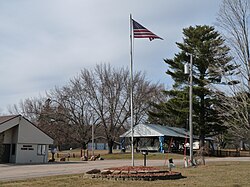 Town hall and park in the hamlet of Sherry, in March