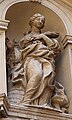 Sculpture on facade depicting Saint Barbara