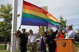 Chief Charles Bordeleau, Mayor Jim Watson, Pride chair Jodie McNamara, and US Ambassador Bruce Heyman in 2014