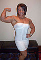 Aleesha Young doing a front right bicep pose at the 2008 NPC Jr. Nationals