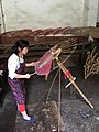 Paper parasol artisan in southern China