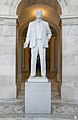 A 1995 statue of Russell by Frederick Hart stands in the building's rotunda