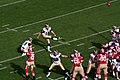 Jeff Wilkins attempts a kick for the Rams