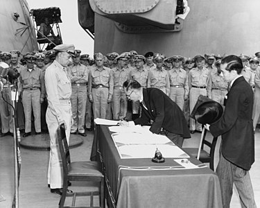 Mamoru Shigemitsu signs the Japanese Instrument of Surrender, by Stephen E. Korpanty (restored by Adam Cuerden)