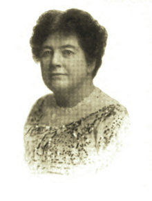 Black and white portait photograph of a middle-aged white woman