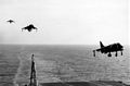 AV-8A Harriers of VMA-231 approach Roosevelt during her final cruise in February 1977.
